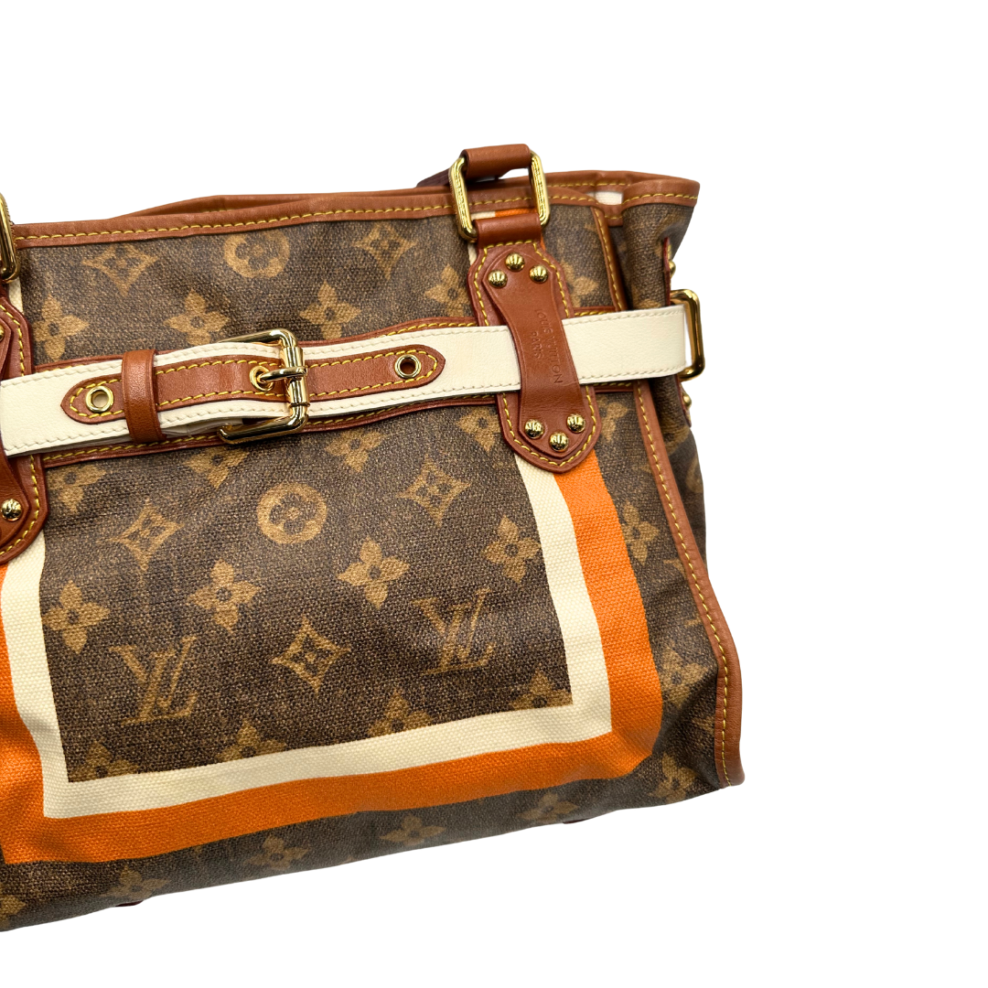  Borsa Louis Vuitton Tisse Rayures in tela monogram arricchita da finiture in pelle color cognac e crema con dettagli metalliche dorate; munita di due manici in pelle. Completa di scatola e dustbag. Originale, usata, di lusso, in ottime condizioni