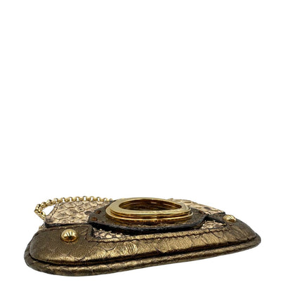 angoli Pochette Dolce & Gabbana sui toni caldi del marrone e del beige, trama animalier e parti metalliche dorate; munita di una mini pochette amovibile. Completa di dustbag, di lusso, originale, ottime condizioni, usata. 