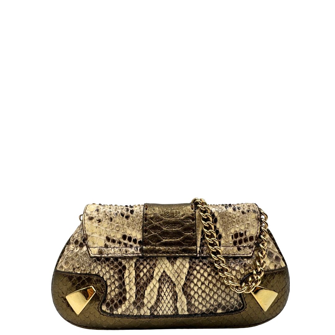 retro Pochette Dolce & Gabbana sui toni caldi del marrone e del beige, trama animalier e parti metalliche dorate; munita di una mini pochette amovibile. Completa di dustbag, di lusso, originale, ottime condizioni, usata. 