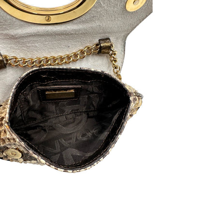 interno Pochette Dolce & Gabbana sui toni caldi del marrone e del beige, trama animalier e parti metalliche dorate; munita di una mini pochette amovibile. Completa di dustbag, di lusso, originale, ottime condizioni, usata. 