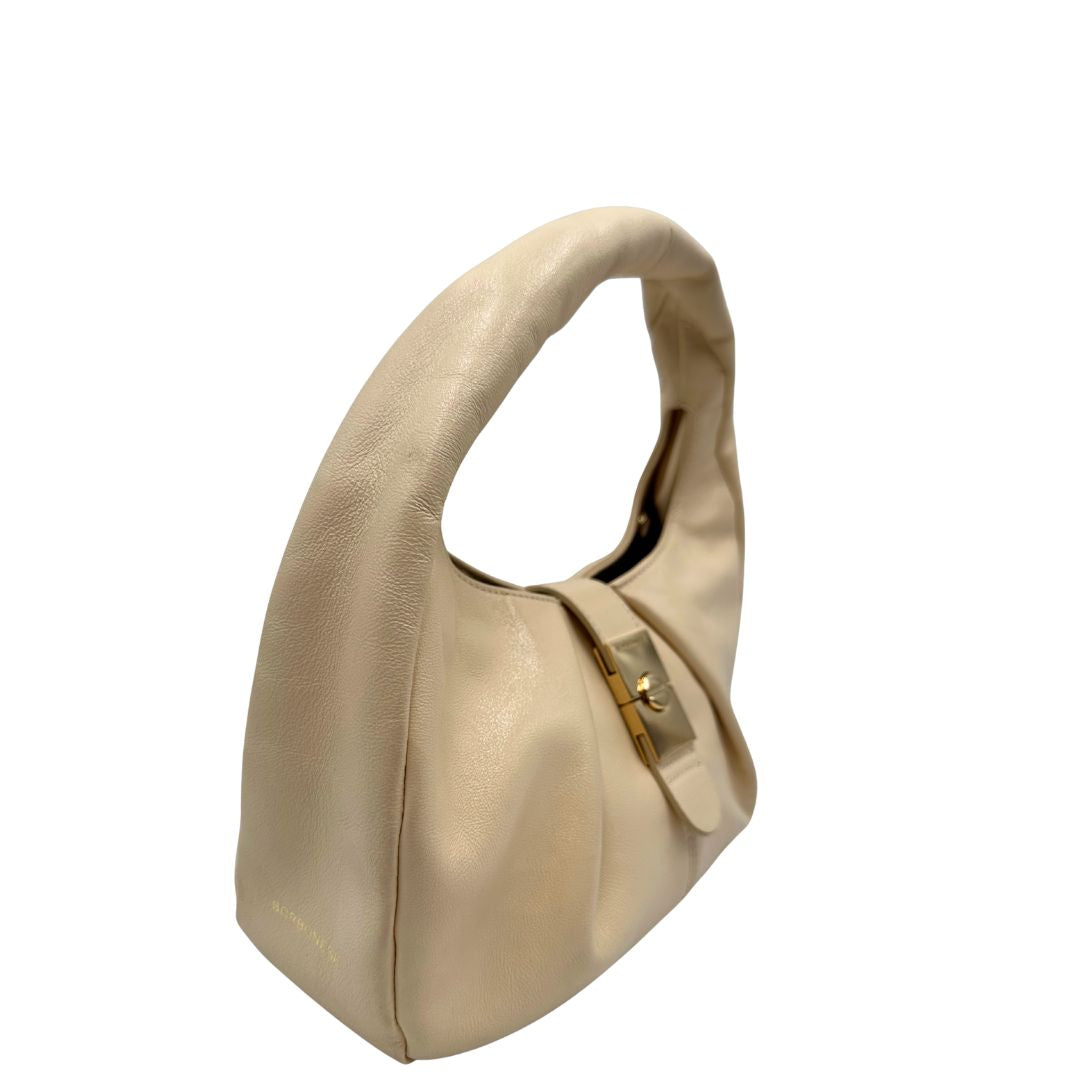 Laterali Borsa Borbonese in pelle biege con parti metalliche dorate; munita di un manico singolo. Completa di dustbag. Originale, usata, di lusso, in ottime condizioni