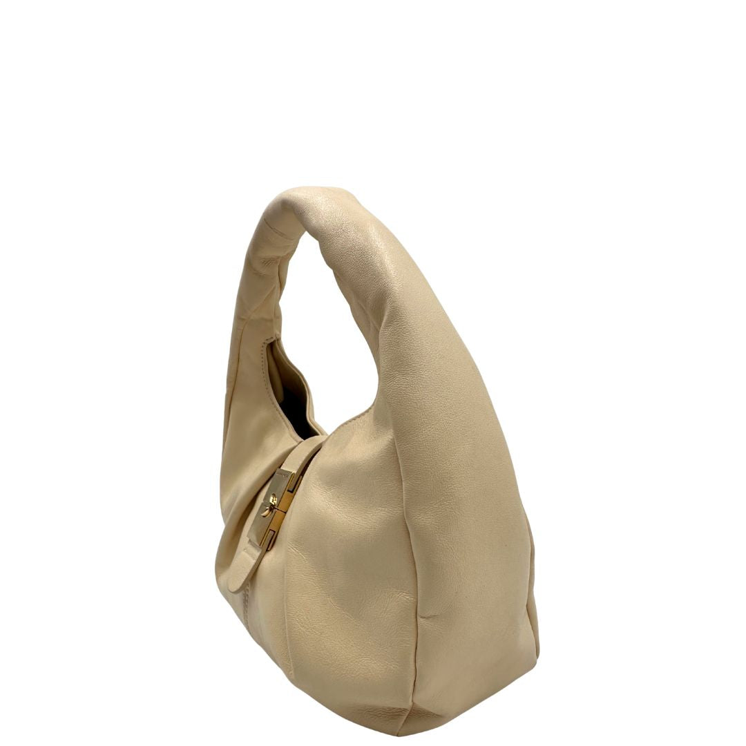 Laterali Borsa Borbonese in pelle biege con parti metalliche dorate; munita di un manico singolo. Completa di dustbag. Originale, usata, di lusso, in ottime condizioni