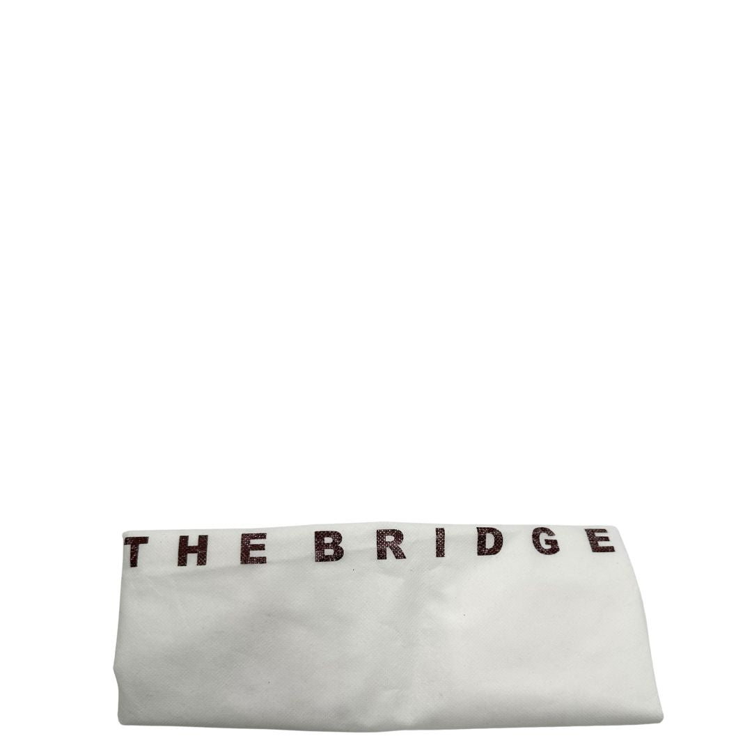 Dustbag Zaino The Bridge in pelle martellata nera, rifinito con parti metalliche dorate, munito di bretelle in pelle regolabili. Completo di dustbag. Originale, usata, di lusso, in ottime condizioni