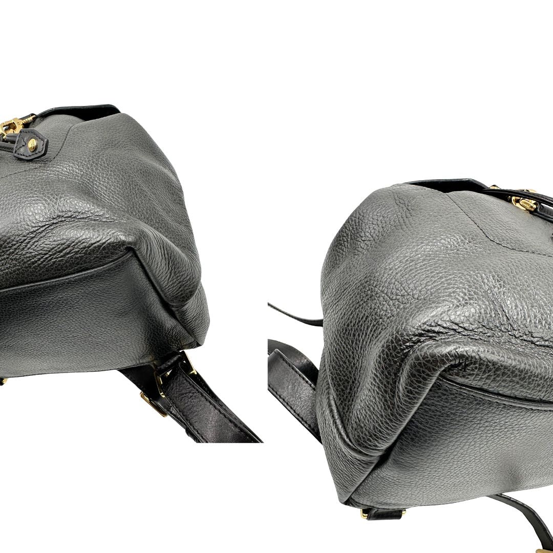 Angoli Zaino The Bridge in pelle martellata nera, rifinito con parti metalliche dorate, munito di bretelle in pelle regolabili. Completo di dustbag. Originale, usata, di lusso, in ottime condizioni