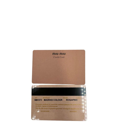 portafoglio Miu Miu in pelle rosa martellata con parti metalliche dorate