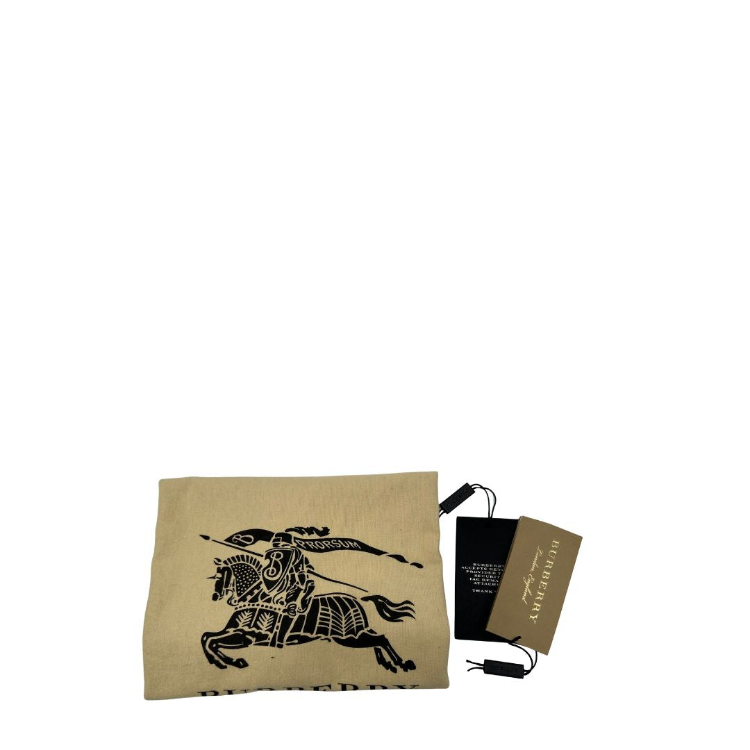 Dustbag di una Borsa Burberry in canvas beige trama tartan rifinita con parti in pelle blu e impreziosita da stampa floreale; indossabile a spalla. Originale, usata, di lusso, in ottime condizioni.