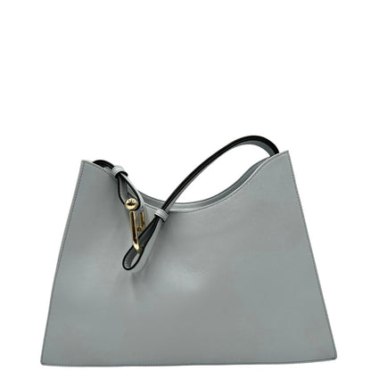 retro  Borsa Furla Nuvola in pelle azzurro polvere con parti metalliche dorate; munita di un manico regolabile e rimovibile. Originale, usata, di lusso, in eccellenti condizioni