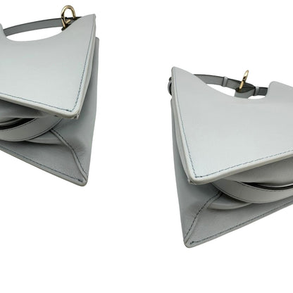 angoli  Borsa Furla Nuvola in pelle azzurro polvere con parti metalliche dorate; munita di un manico regolabile e rimovibile. Originale, usata, di lusso, in eccellenti condizioni