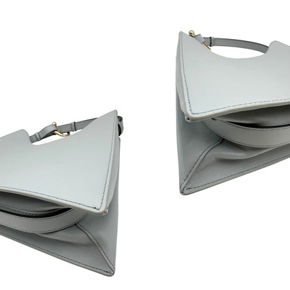 angoli  Borsa Furla Nuvola in pelle azzurro polvere con parti metalliche dorate; munita di un manico regolabile e rimovibile. Originale, usata, di lusso, in eccellenti condizioni