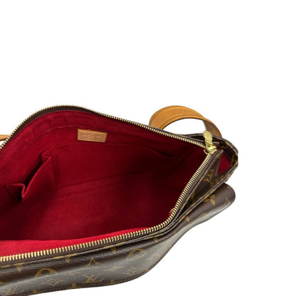 Interno di una Borsa LV Viva Cité in canvas monogram con finiture in vacchetta naturale e parti metalliche dorate; indossabile a spalla. Completa di dustbag. Originale, usata, di lusso, in ottime condizioni.