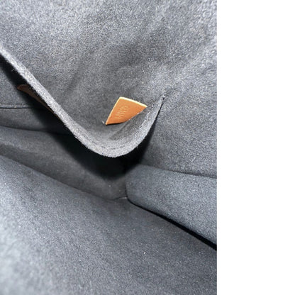 Codice di una Borsa Dauphine Mini Louis Vuitton in tela monogram, e monogram reverse bicolore con finiture in pelle cognac e parti metalliche dorate, munita di una tracolla in pelle allungabile e un manico in catena, amovibili. Originale, usata, di lusso, in ottime condizioni