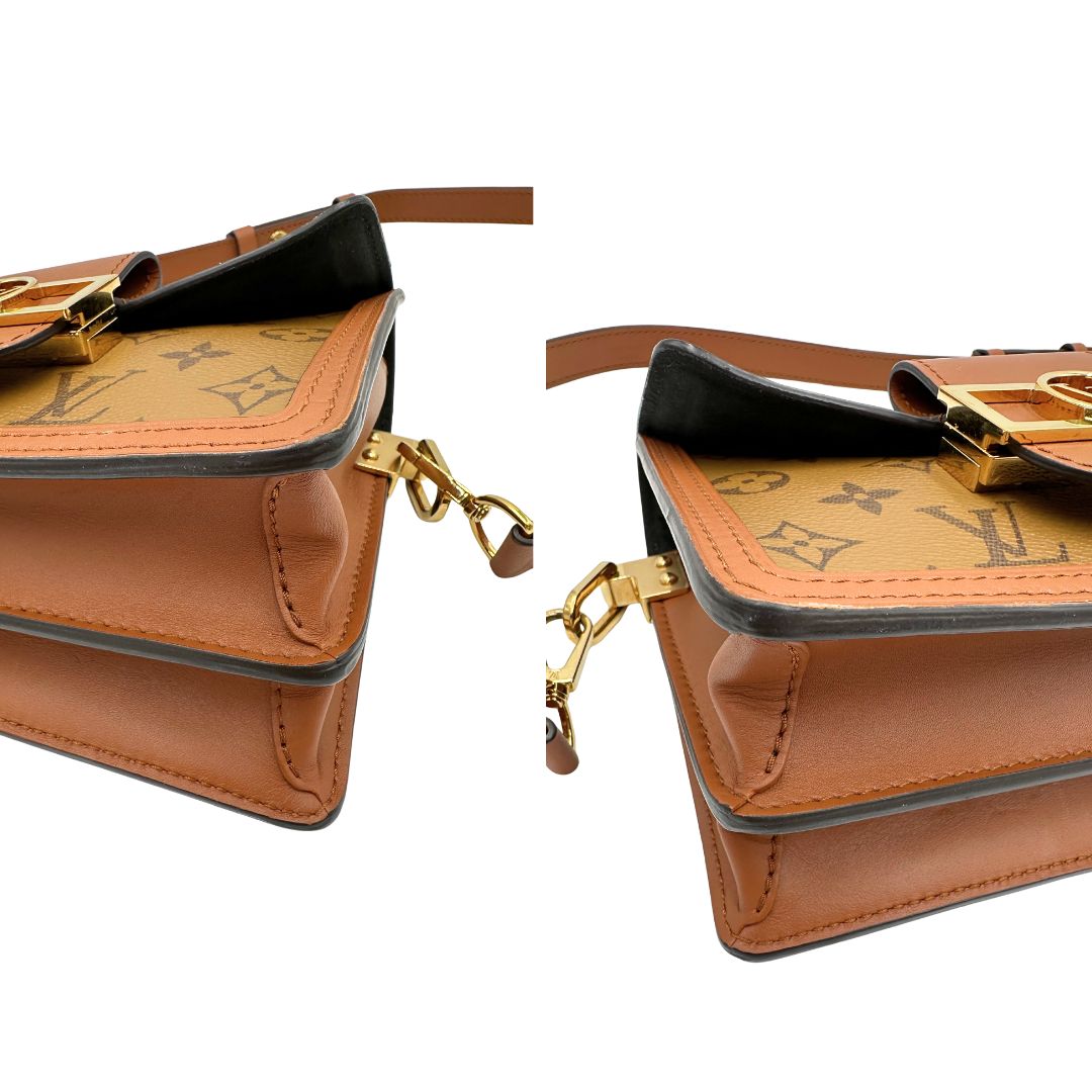 Angoli di una Borsa Dauphine Mini Louis Vuitton in tela monogram, e monogram reverse bicolore con finiture in pelle cognac e parti metalliche dorate, munita di una tracolla in pelle allungabile e un manico in catena, amovibili. Originale, usata, di lusso, in ottime condizioni