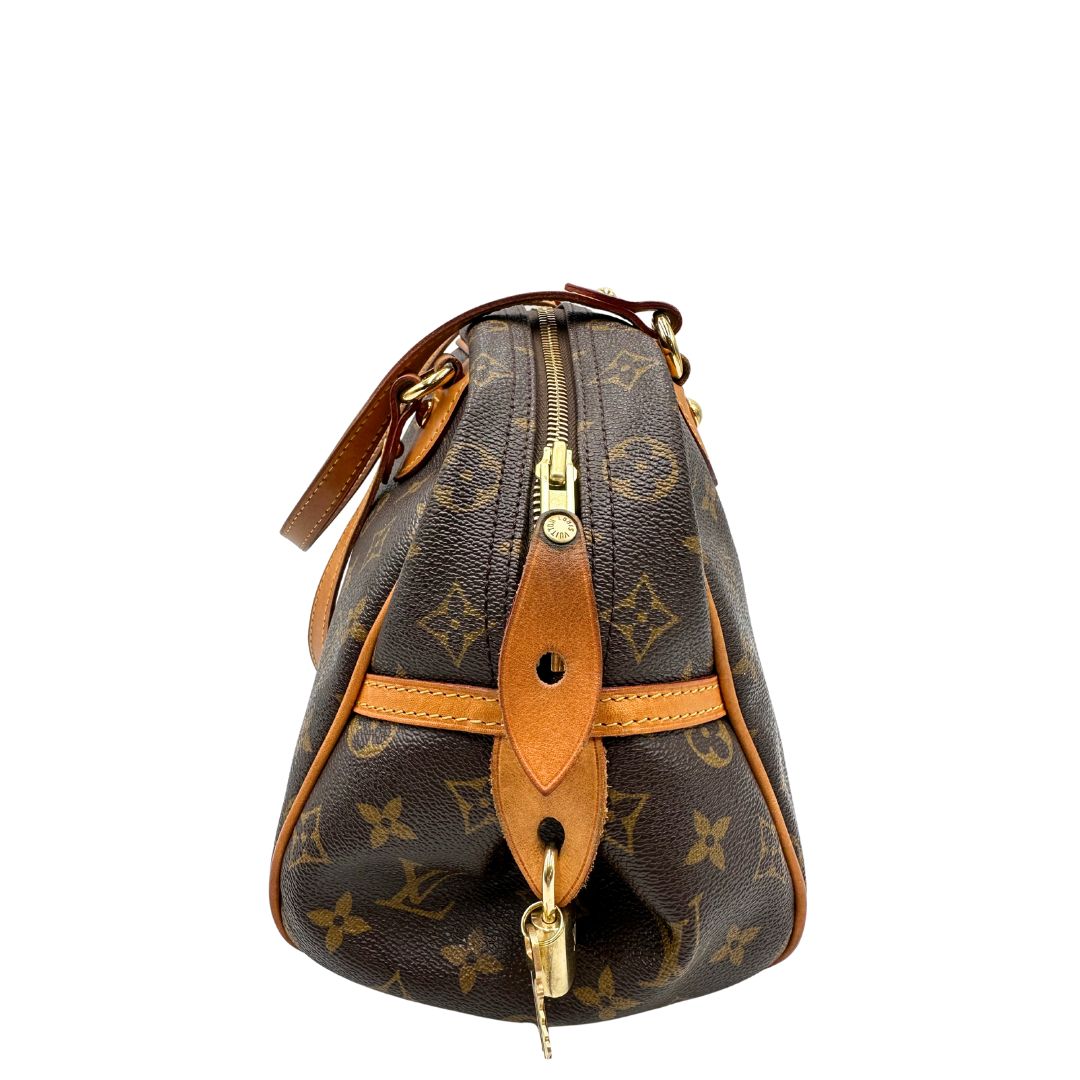 Borsa Montorgueil Louis Vuitton in canvas marrone monogram con finiture in vacchetta naturale e parti metalliche dorate; da indossare a spalla. Originale, usata, di lusso, in ottime condizioni.