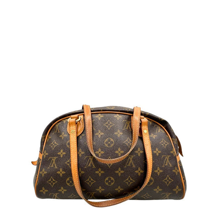 Retro di una Borsa Montorgueil Louis Vuitton in canvas marrone monogram con finiture in vacchetta naturale e parti metalliche dorate; da indossare a spalla. Originale, usata, di lusso, in ottime condizioni.