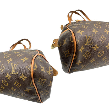 Angoli di una Borsa Montorgueil Louis Vuitton in canvas marrone monogram con finiture in vacchetta naturale e parti metalliche dorate; da indossare a spalla. Originale, usata, di lusso, in ottime condizioni.