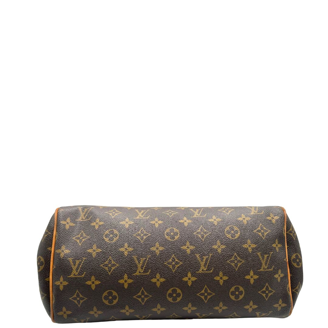 Base di una Borsa Montorgueil Louis Vuitton in canvas marrone monogram con finiture in vacchetta naturale e parti metalliche dorate; da indossare a spalla. Originale, usata, di lusso, in ottime condizioni.