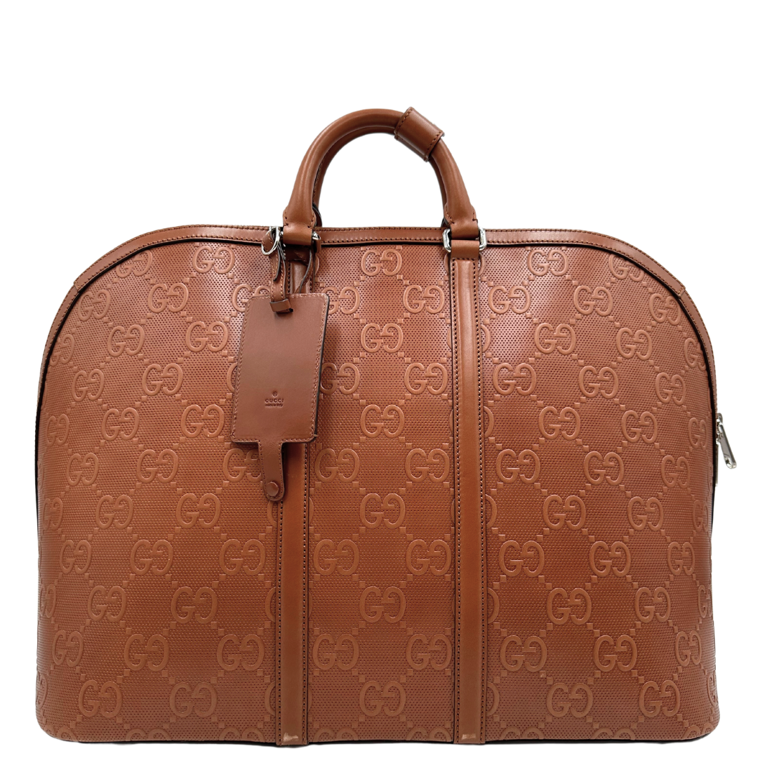 Gucci Duffle large embossed