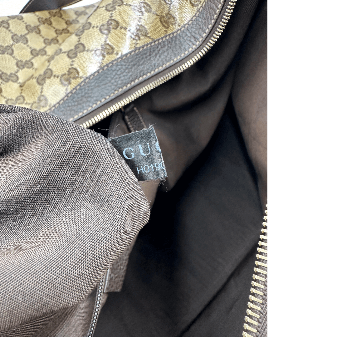 Black gucci luggage hotsell