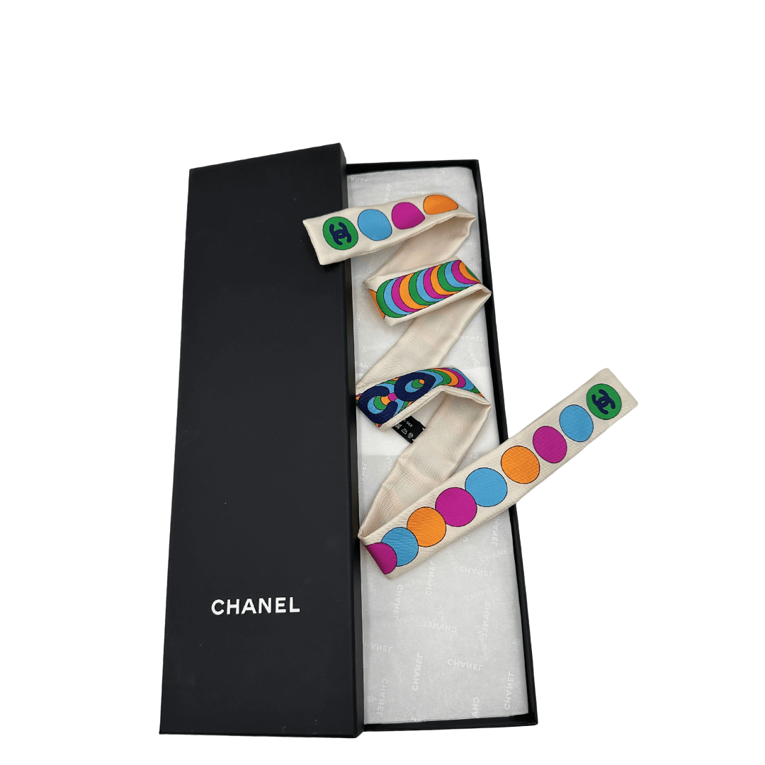 Bandeau Chanel in seta con cerchi multicolore. Accessori di lusso usati