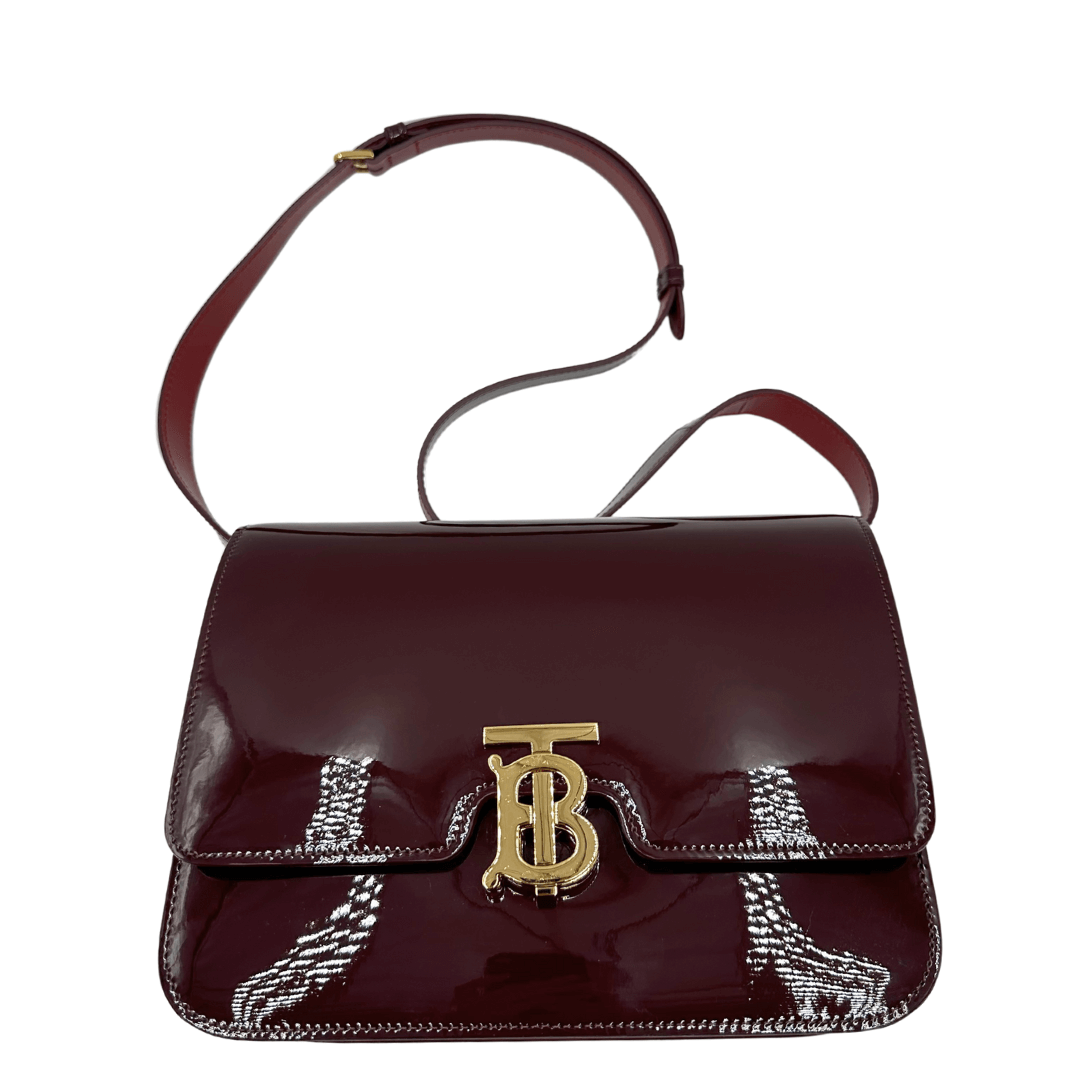 Borsa con tracolla Burberry in pelle verniciata vinaccio e chiusura TB. Bag originale, usata, condizioni eccellenti