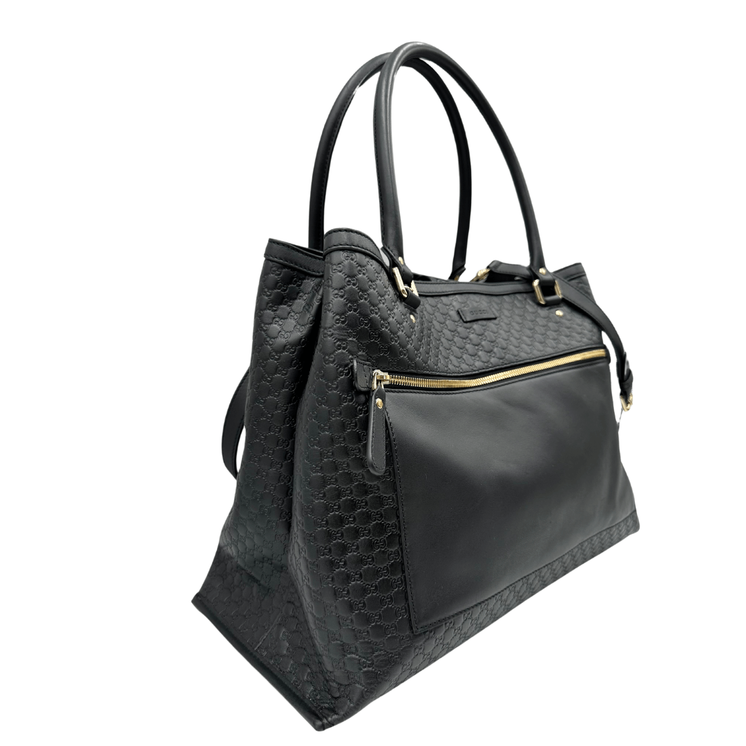 Borsa Gucci con tracolla realizzata in pelle gg empreinte. Borse di lusso usate