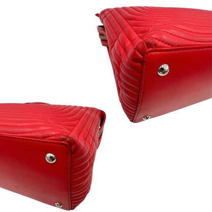 angoli Borsa Dot Com Fendi in pelle rossa con parti metalliche argentate con manico singolo e tracolla scorrevole in catena con spallaccio in pelle
