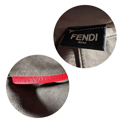 interno Borsa Dot Com Fendi in pelle rossa con parti metalliche argentate con manico singolo e tracolla scorrevole in catena con spallaccio in pelle. 