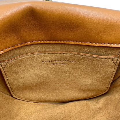 Borsa Stella McCartney in pelle color marrone bruciato con parti metalliche argentate e dorate. Completa di dustbag.