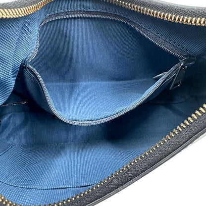 interno Borsa Furla in pelle nera con parti metalliche dorate; munita di un manico singolo, indossabile a spalla. Completa di dustbag  