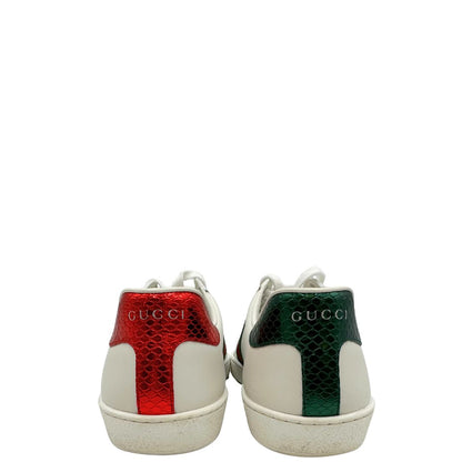  Scarpe Gucci in pelle bianca impreziosite da striscia Web verde e rossa. Complete di corredo, di lusso, originali, ottime condizioni.