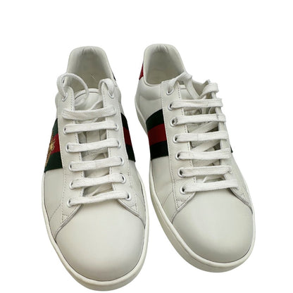  Scarpe Gucci in pelle bianca impreziosite da striscia Web verde e rossa. Complete di corredo, di lusso, originali, ottime condizioni.