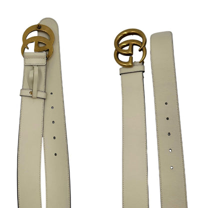  Cintura Gucci in pelle bianca con parti metalliche dorate. Completa di dustbag, di lusso, originale, eccellenti condizioni.