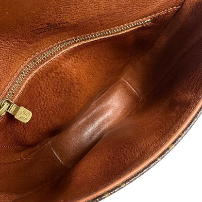 interno Borsa L.V. in canvas marrone monogram con finiture in vacchetta naturale e parti metalliche dorate; munita di una tracolla regolabile, di lusso, ottimo stato, usata. 