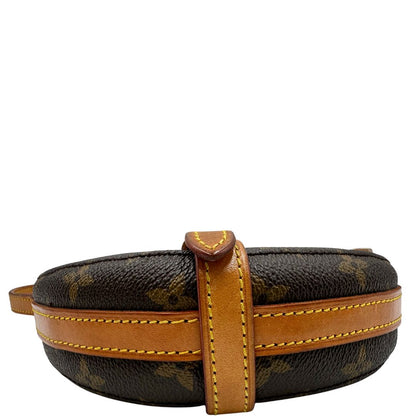 base Borsa L.V. in canvas marrone monogram con finiture in vacchetta naturale e parti metalliche dorate; munita di una tracolla regolabile, di lusso, ottimo stato, usata. 