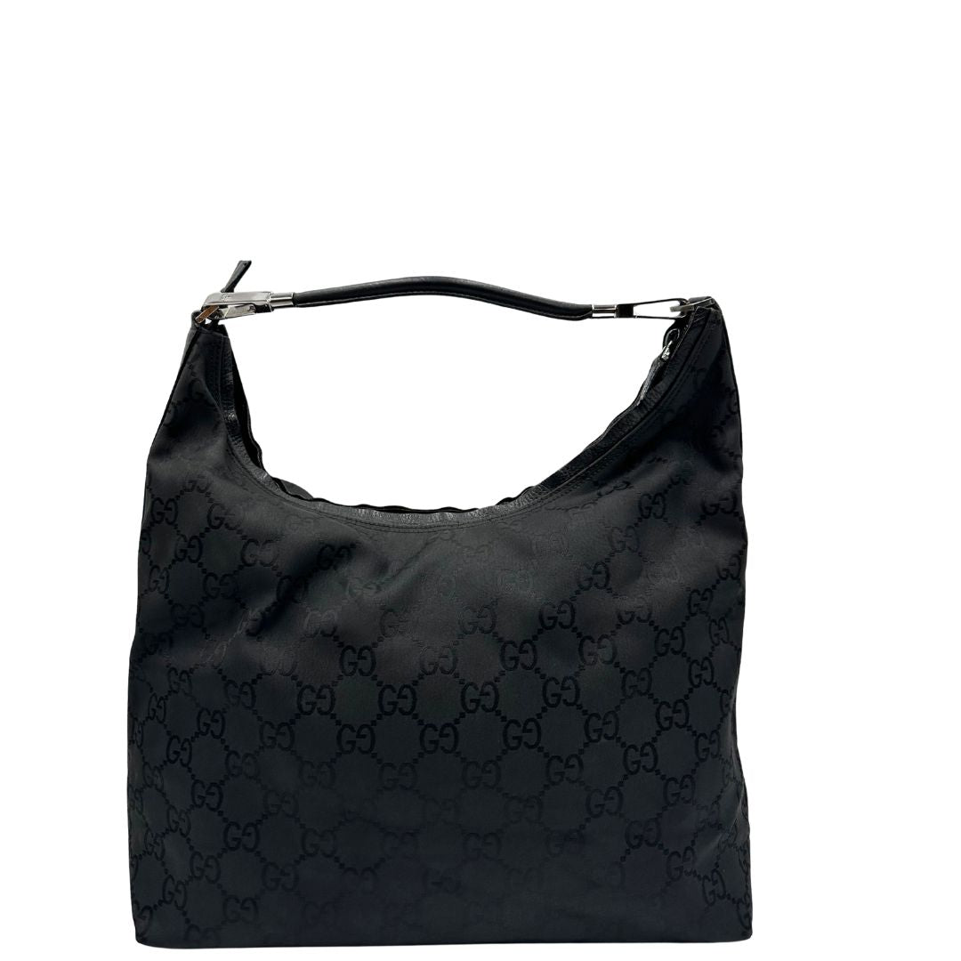 retro Borsa Gucci in tessuto GG monogram con finiture in pelle tono su tono e parti metalliche argentate; munita di un manico singolo, indossabile a spalla, di lusso, originale, ottime condizioni. 