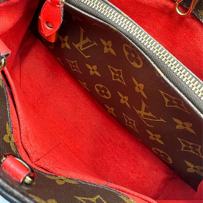 interno Borsa Louis Vuitton in canvas marrone monogram con finiture in pelle multicolore e parti metalliche dorate; munita di doppi manici intrecciati e una tracolla amovibile. Completa di lucchetto e chiavi, di lusso, originale, ottime condizioni. 