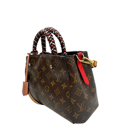 lato Borsa Louis Vuitton in canvas marrone monogram con finiture in pelle multicolore e parti metalliche dorate; munita di doppi manici intrecciati e una tracolla amovibile. Completa di lucchetto e chiavi, di lusso, originale, ottime condizioni.