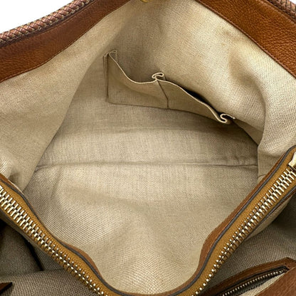 interno Borsa Gucci in tessuto GG monogram con finiture in pelle marroni e parti metalliche dorate; munita di doppi manici, da portare a spalla, di lusso, originale, ottime condizioni. 