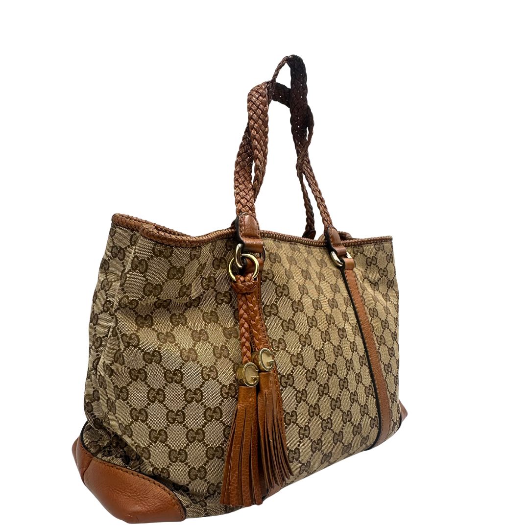 Borsa Gucci in tessuto GG monogram con finiture in pelle marroni e parti metalliche dorate; munita di doppi manici, da portare a spalla, di lusso, originale, ottime condizioni.