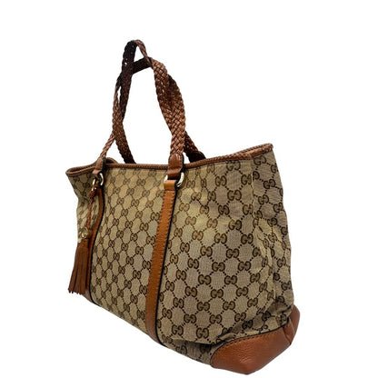 Borsa Gucci in tessuto GG monogram con finiture in pelle marroni e parti metalliche dorate; munita di doppi manici, da portare a spalla, di lusso, originale, ottime condizioni.