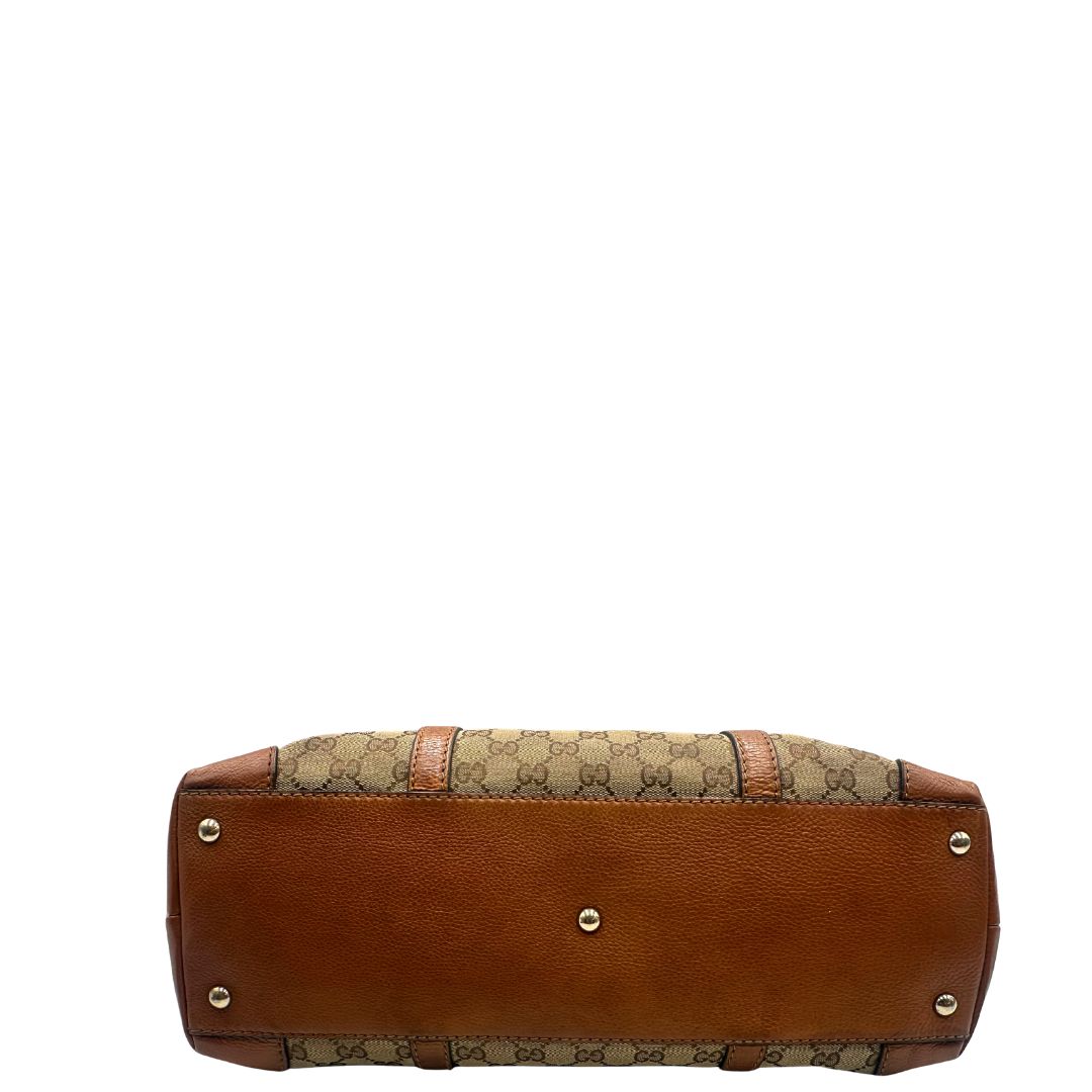 base Borsa Gucci in tessuto GG monogram con finiture in pelle marroni e parti metalliche dorate; munita di doppi manici, da portare a spalla, di lusso, originale, ottime condizioni. 