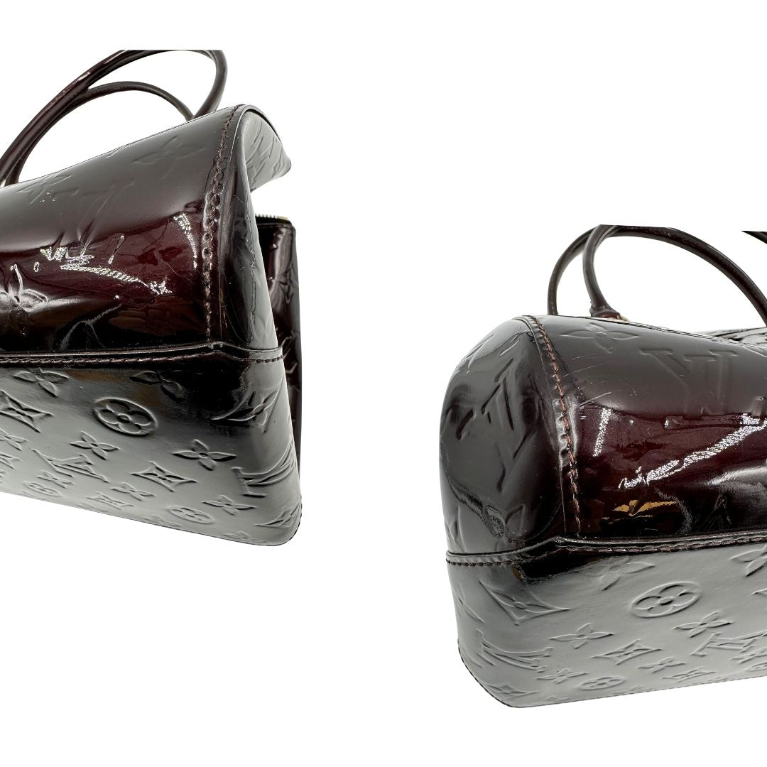 Angoli Borsa Louis Vuitton in pelle Vernis color amaranto con trama monogram e parti metalliche dorate. Munita di doppi manici stondati; da portare a spalla. Originale, usata, di lusso, in ottime condizioni