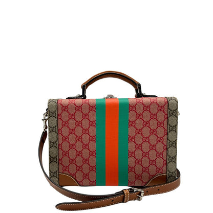 retro Valigia rigida Gucci in canvas GG Supreme monogram con finiture in pelle marroni e parti metalliche argentate; munita di un manico singolo e una tracolla amovibile e regolabile. Completa di corredo, di lusso, originale, eccellenti condizioni.  