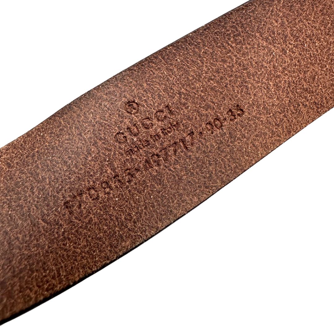 Cintura Gucci in pelle color testa di moro con parti metalliche tono su tono, di lusso, originale, ottime condizioni.