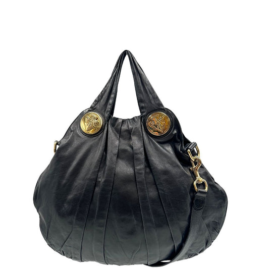 front  Borsa Gucci in pelle nera con parti metalliche dorate; munita di doppi manici e una tracolla amovibile. Completa di dustbag, di lusso, originale, ottime condizioni. 