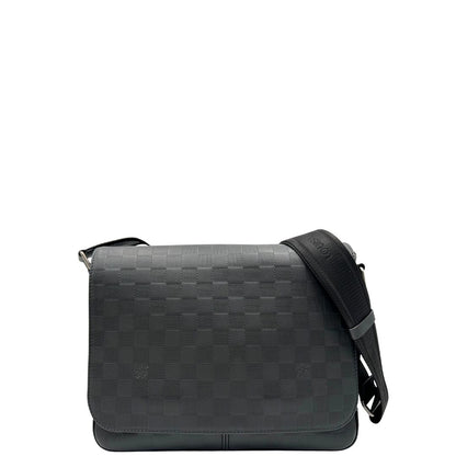 front Borsa messenger in canvas nero e parti metalliche argento opaco; munita di una tracolla in tessuto regolabile. Completa di corredo, di lusso, originale, ottime condizioni. 