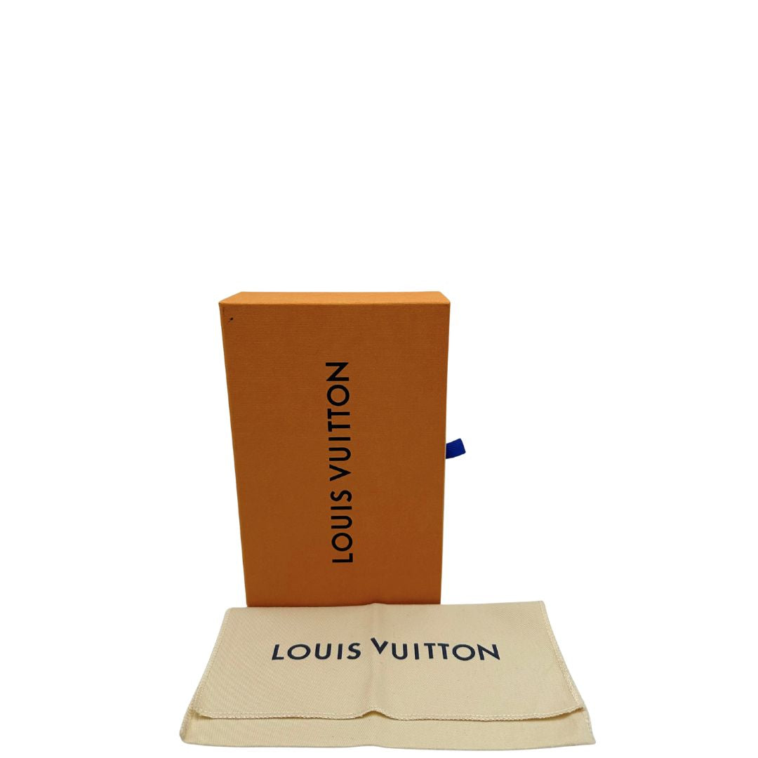 corredo Portafoglio Louis Vuitton in canvas Damier Graphite con parti metalliche argentate; munito di un polsino. Completo di corredo, di lusso, originale, ottime condizioni. 