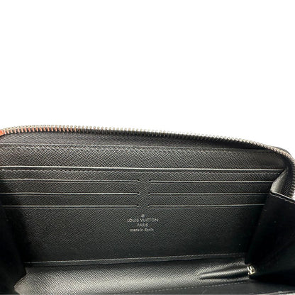 interno Portafoglio Louis Vuitton in canvas Damier Graphite con parti metalliche argentate; munito di un polsino. Completo di corredo, di lusso, originale, ottime condizioni. 