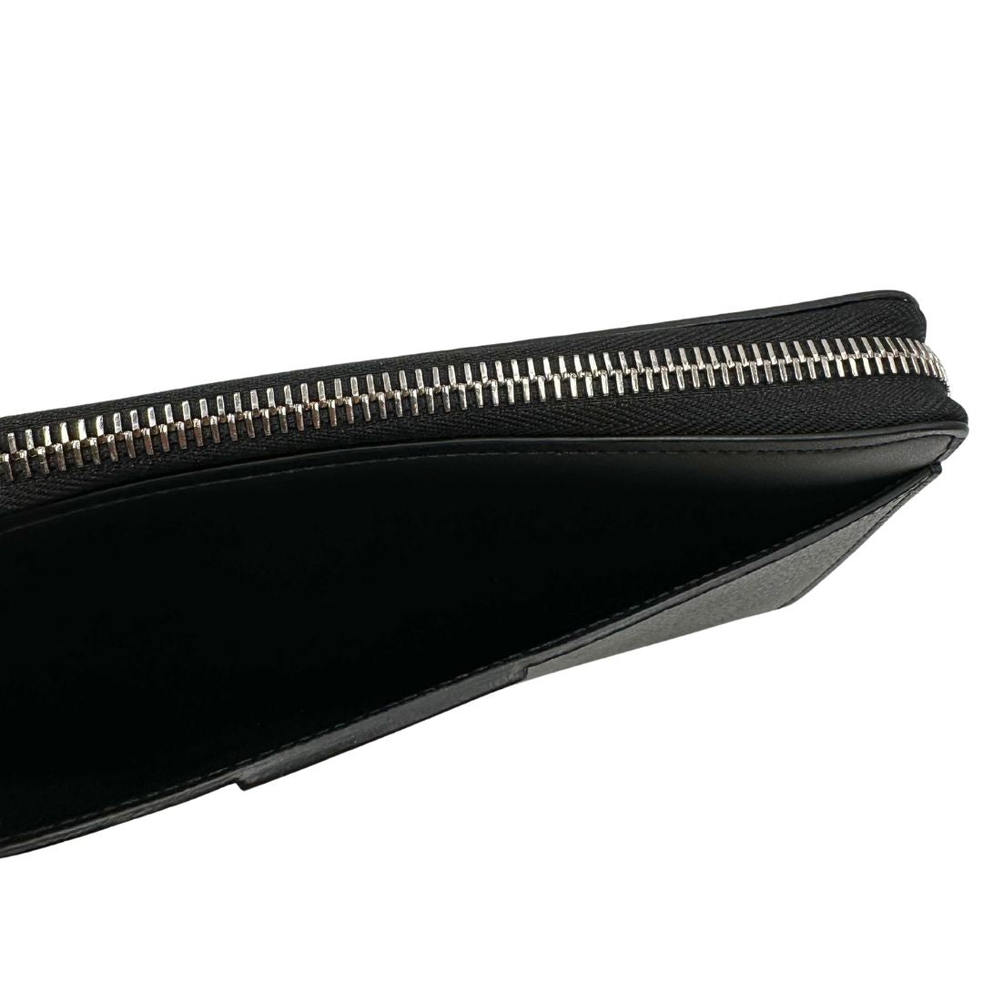 interno Portafoglio Louis Vuitton in canvas Damier Graphite con parti metalliche argentate; munito di un polsino. Completo di corredo, di lusso, originale, ottime condizioni. 