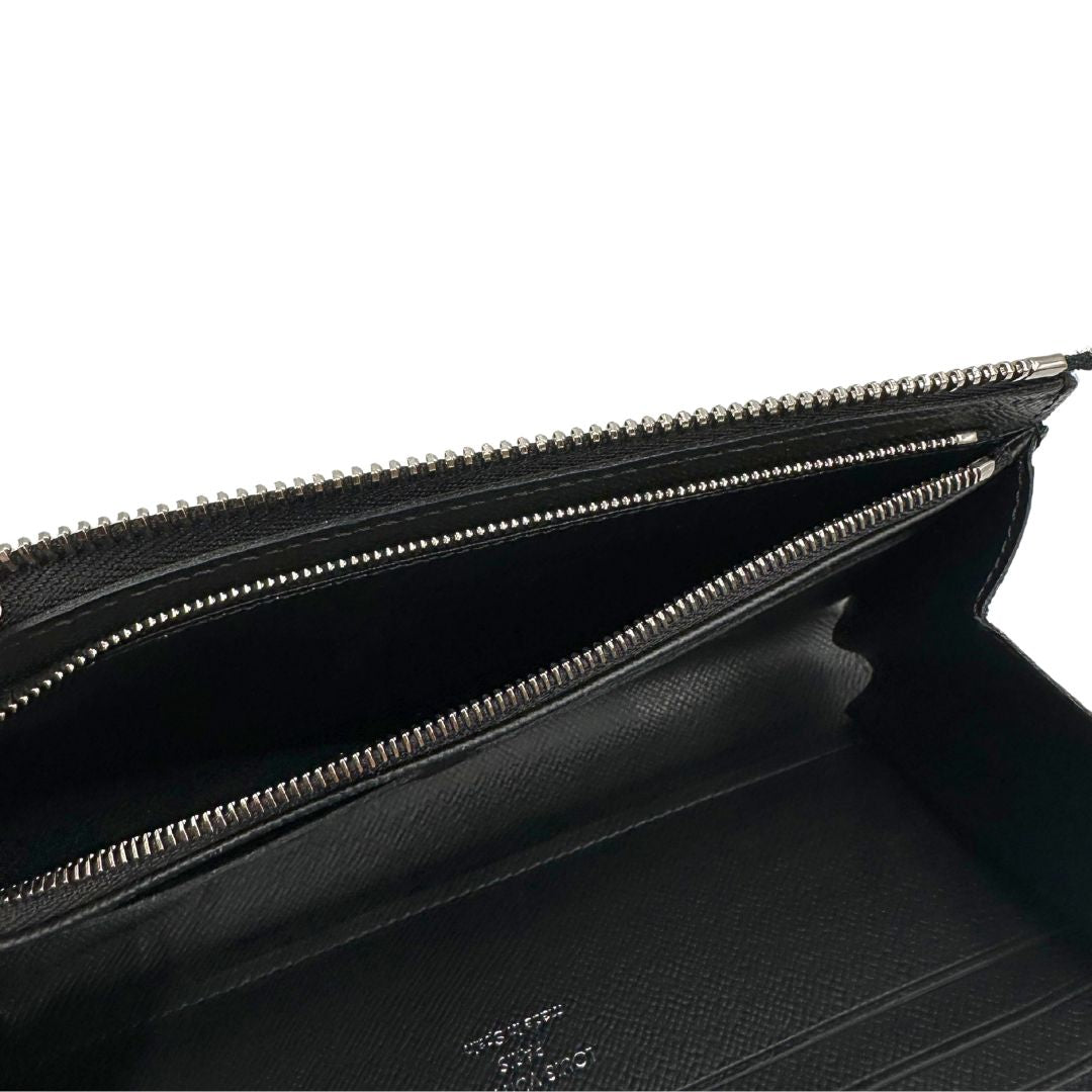 interno Portafoglio Louis Vuitton in canvas Damier Graphite con parti metalliche argentate; munito di un polsino. Completo di corredo, di lusso, originale, ottime condizioni. 